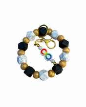 Load image into Gallery viewer, Gradient Spectrum Geometric Keychain Wristlet with Infinity Fidget Charm